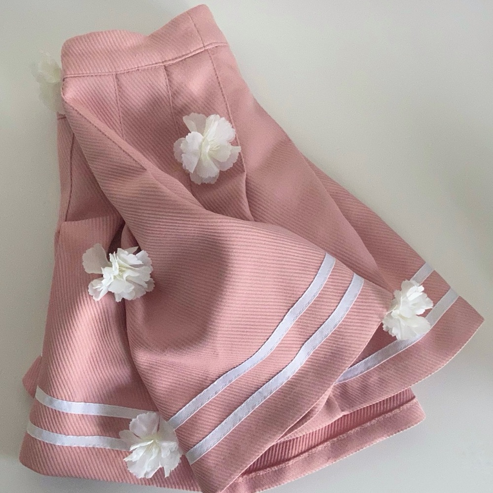 pastel pink pleated skirt with two white stripes!